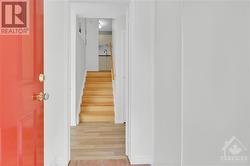 Enter the foyer with a double closet and separation from the living space. - 