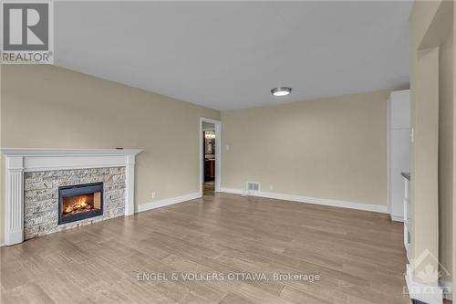 6036 Perth Street, Ottawa, ON - Indoor Photo Showing Living Room With Fireplace