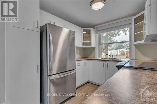 6036 Perth Street, Ottawa, ON - Indoor Photo Showing Kitchen With Double Sink