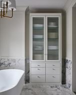 Custom built-ins w/ reeded glass doors - 