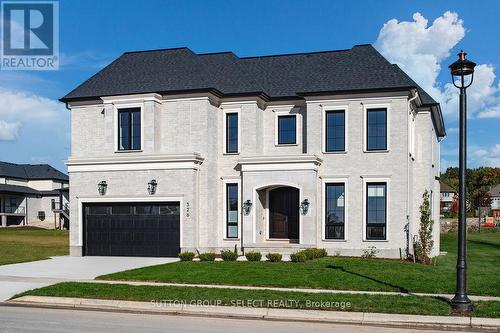 Concrete driveway & walks Renaissance Stone/stucco - 326 Manhattan Drive, London, ON 