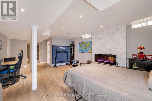 21 Killington Avenue, Vaughan (Kleinburg), ON - Indoor Photo Showing Bedroom With Fireplace