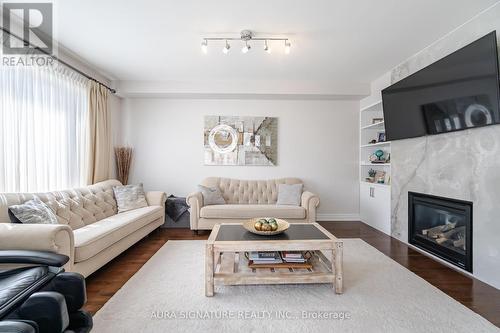 21 Killington Avenue, Vaughan (Kleinburg), ON - Indoor Photo Showing Living Room With Fireplace