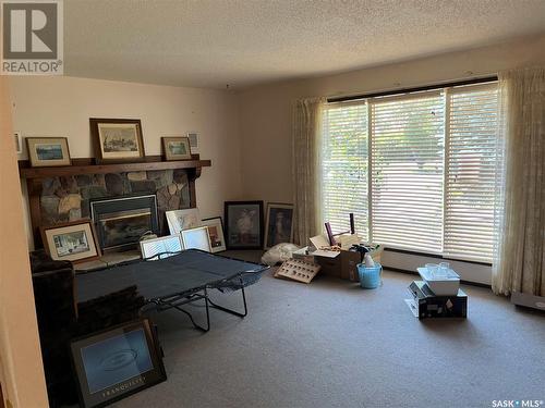 533 Main Street, Lafleche, SK - Indoor Photo Showing Living Room With Fireplace