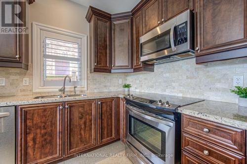 3360 Roma Avenue, Burlington, ON - Indoor Photo Showing Kitchen With Stainless Steel Kitchen With Double Sink