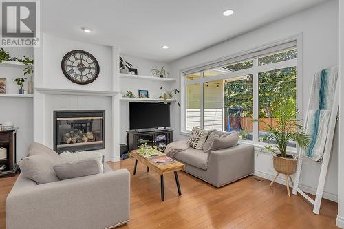 4813 Dillon Place, Kelowna, BC - Indoor Photo Showing Living Room With Fireplace