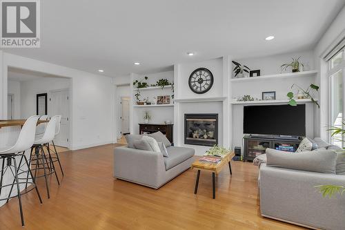 4813 Dillon Place, Kelowna, BC - Indoor Photo Showing Living Room With Fireplace