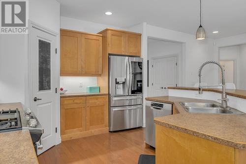 4813 Dillon Place, Kelowna, BC - Indoor Photo Showing Kitchen With Double Sink