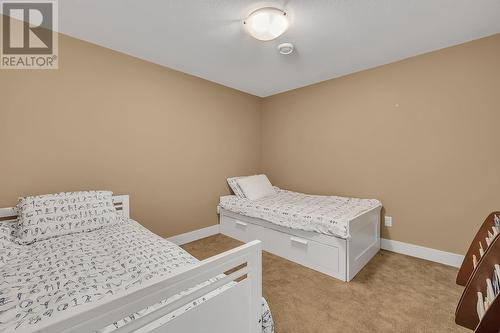 4813 Dillon Place, Kelowna, BC - Indoor Photo Showing Bedroom