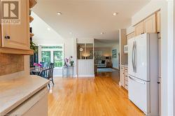 Hardwood floor throughout main living space. - 