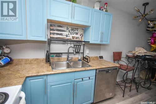 210 512 4Th Avenue N, Saskatoon, SK - Indoor Photo Showing Kitchen With Double Sink