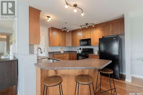 408 902 Spadina Crescent E, Saskatoon, SK - Indoor Photo Showing Kitchen With Double Sink