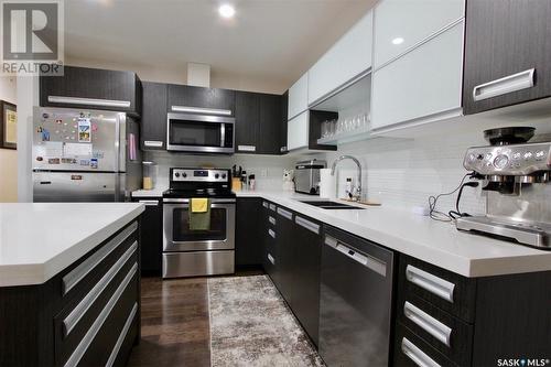 315 1545 Neville Drive, Regina, SK - Indoor Photo Showing Kitchen With Stainless Steel Kitchen With Double Sink With Upgraded Kitchen