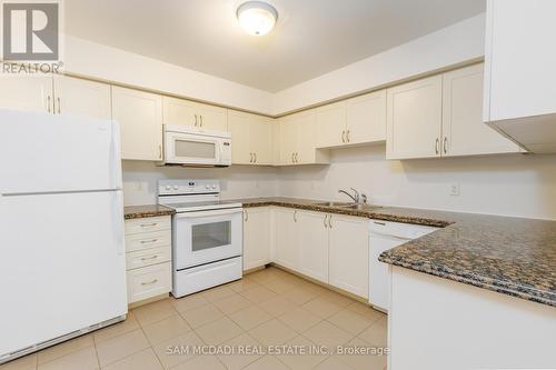 15 - 2464 Post Road, Oakville (River Oaks), ON - Indoor Photo Showing Kitchen With Double Sink