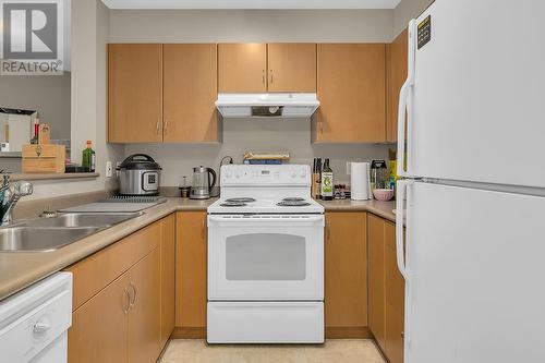 567 Yates Road Unit# 201, Kelowna, BC - Indoor Photo Showing Kitchen With Double Sink