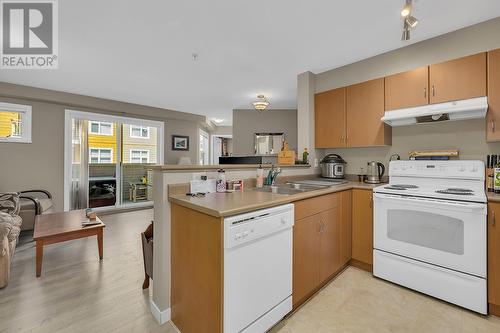 567 Yates Road Unit# 201, Kelowna, BC - Indoor Photo Showing Kitchen With Double Sink