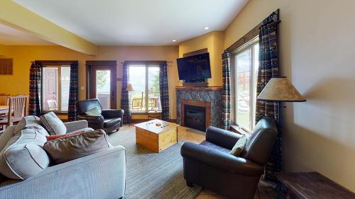 D1-C - 1351 Gerry Sorensen Way, Kimberley, BC - Indoor Photo Showing Living Room With Fireplace