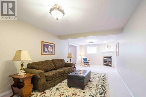 19 Ferguson Lane, Quinte West, ON - Indoor Photo Showing Living Room With Fireplace