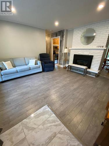 644 Chestnut Street, Innisfil, ON - Indoor Photo Showing Living Room With Fireplace