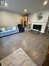 644 Chestnut Street, Innisfil, ON  - Indoor Photo Showing Living Room With Fireplace 