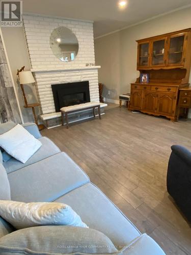 644 Chestnut Street, Innisfil, ON - Indoor Photo Showing Living Room With Fireplace