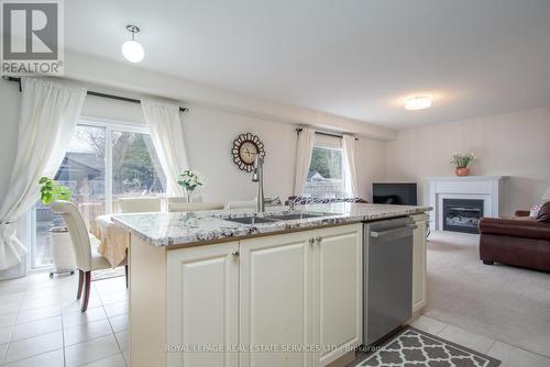 757 Halbert Drive, Shelburne, ON - Indoor Photo Showing Kitchen With Fireplace