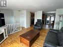 912 Aronec Place, La Ronge, SK  - Indoor Photo Showing Living Room With Fireplace 