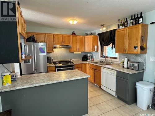 912 Aronec Place, La Ronge, SK - Indoor Photo Showing Kitchen With Double Sink