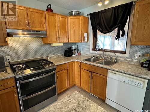 912 Aronec Place, La Ronge, SK - Indoor Photo Showing Kitchen With Double Sink