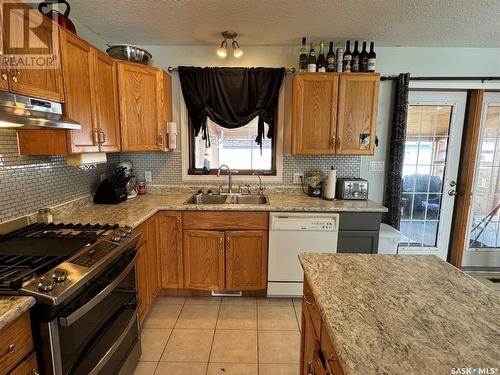 912 Aronec Place, La Ronge, SK - Indoor Photo Showing Kitchen With Double Sink