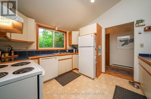 9919 Pinery Lane, Lambton Shores (Grand Bend), ON - Indoor Photo Showing Kitchen With Double Sink