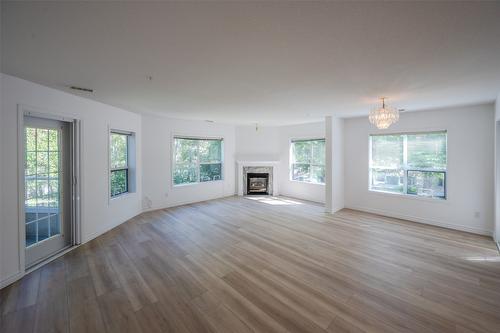 207-2245 Atkinson Street, Penticton, BC - Indoor Photo Showing Living Room With Fireplace