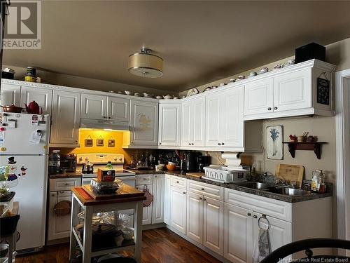 10 Boucher Street, Campbellton, NB - Indoor Photo Showing Kitchen With Double Sink