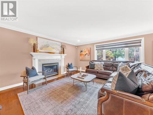 455 Orchard Park Drive, Lakeshore, ON - Indoor Photo Showing Living Room With Fireplace