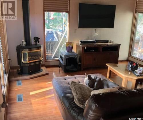 144 Oak Place, Turtle Lake, SK - Indoor Photo Showing Living Room With Fireplace