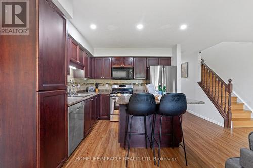 66 - 355 Fisher Mills Road, Cambridge, ON - Indoor Photo Showing Kitchen With Double Sink