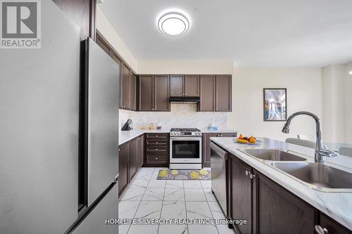 16 Cahill Drive, Brantford, ON - Indoor Photo Showing Kitchen With Double Sink