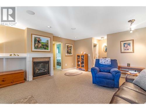 389 Mccarren Avenue, Kelowna, BC - Indoor Photo Showing Living Room With Fireplace