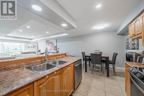 308 - 990 Golf Links Road, Hamilton (Meadowlands), ON - Indoor Photo Showing Kitchen With Double Sink