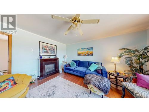 8901 92Nd Avenue, Osoyoos, BC - Indoor Photo Showing Living Room With Fireplace