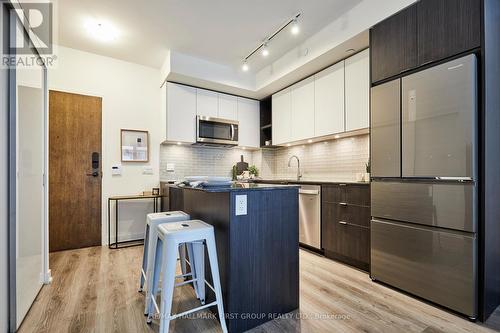 217 - 100 Eagle Rock Way, Vaughan, ON - Indoor Photo Showing Kitchen With Stainless Steel Kitchen With Upgraded Kitchen