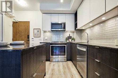 217 - 100 Eagle Rock Way, Vaughan, ON - Indoor Photo Showing Kitchen With Stainless Steel Kitchen With Upgraded Kitchen