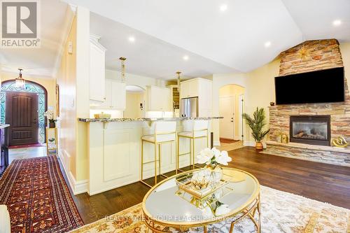 24 Wendat Trail, Springwater (Midhurst), ON - Indoor Photo Showing Living Room With Fireplace