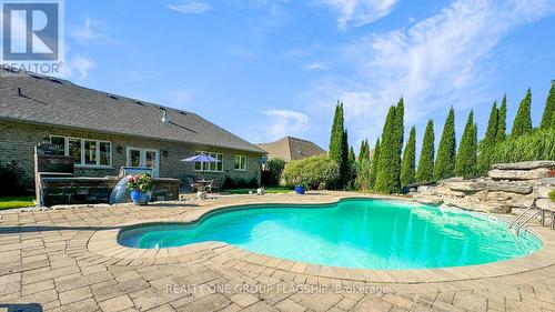 24 Wendat Trail, Springwater (Midhurst), ON - Outdoor With In Ground Pool