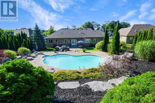 24 Wendat Trail, Springwater (Midhurst), ON - Outdoor With In Ground Pool