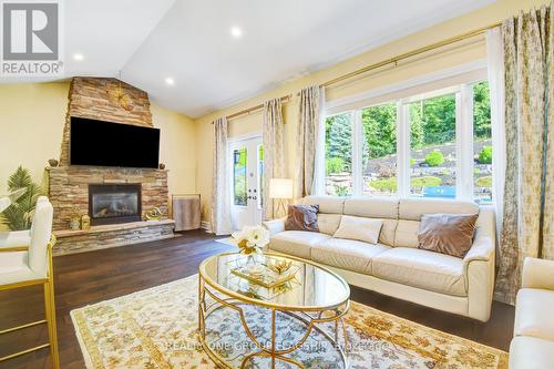 24 Wendat Trail, Springwater (Midhurst), ON - Indoor Photo Showing Living Room With Fireplace