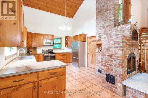 5745 Line 3 N, Midland, ON - Indoor Photo Showing Kitchen With Fireplace