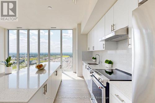 Ph203 - 9000 Jane Street, Vaughan, ON - Indoor Photo Showing Kitchen With Upgraded Kitchen