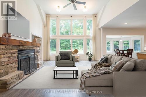 639 Concession 16 E Road, Tiny, ON - Indoor Photo Showing Living Room With Fireplace