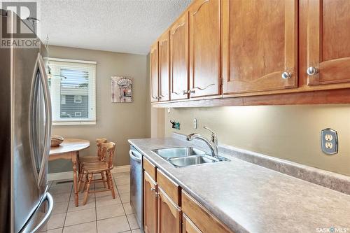 229 Langevin Crescent, Saskatoon, SK - Indoor Photo Showing Kitchen With Double Sink